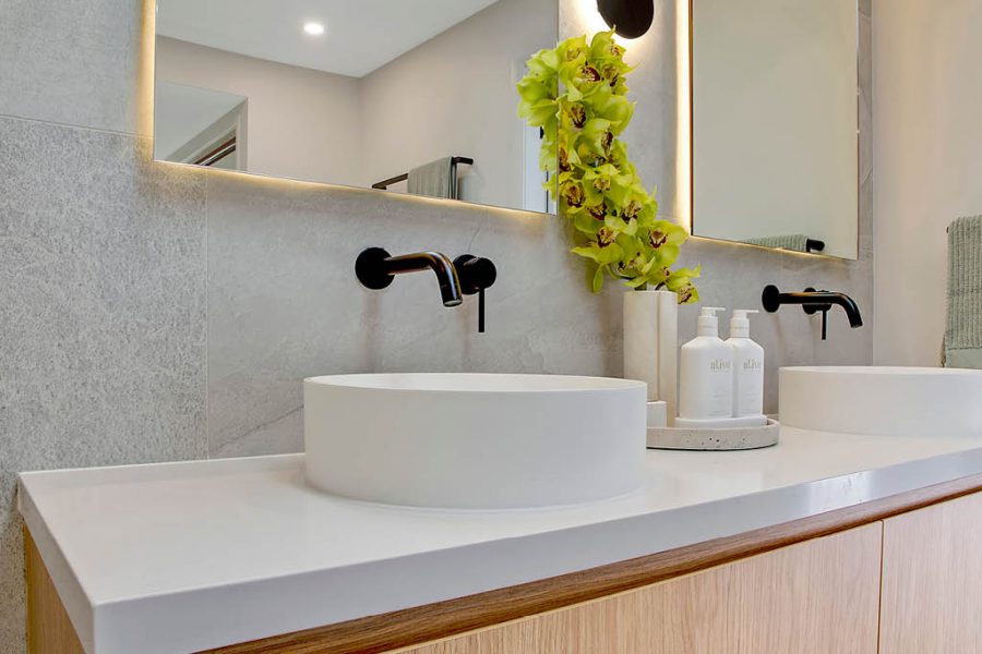 Mount Annan Modern Bathroom with matte black mixer taps , white stone vanity and white basins
